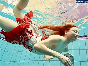 red-hot polish ginger-haired swimming in the pool