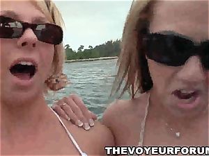 inexperienced girly-girl bathing suit babes have a playful intercourse on a boat