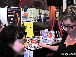 milf plays with her stepdaughter's snatch in the shop